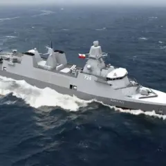 Nowoczesne fregaty AH140 z numerem 724 i helikopterem na pokładzie prują fale.